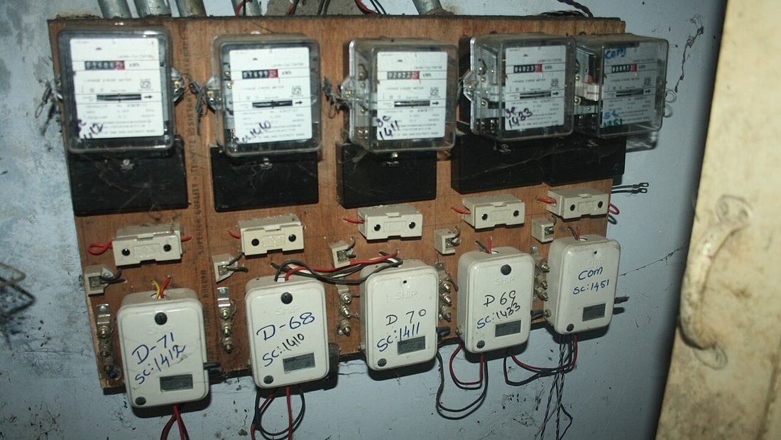 Row of domestic electricity meters in India showing the units that a rooftop solar system in Raipur can reduce