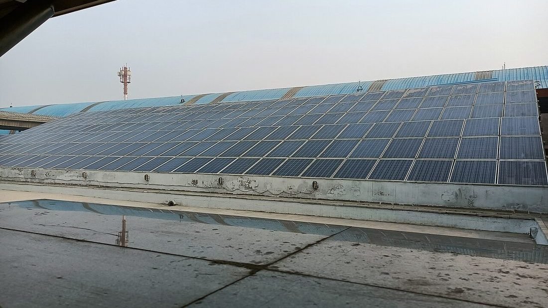 Rooftop solar panel system installed on an Indian railway station building, similar to solar installations near Raipur Junction